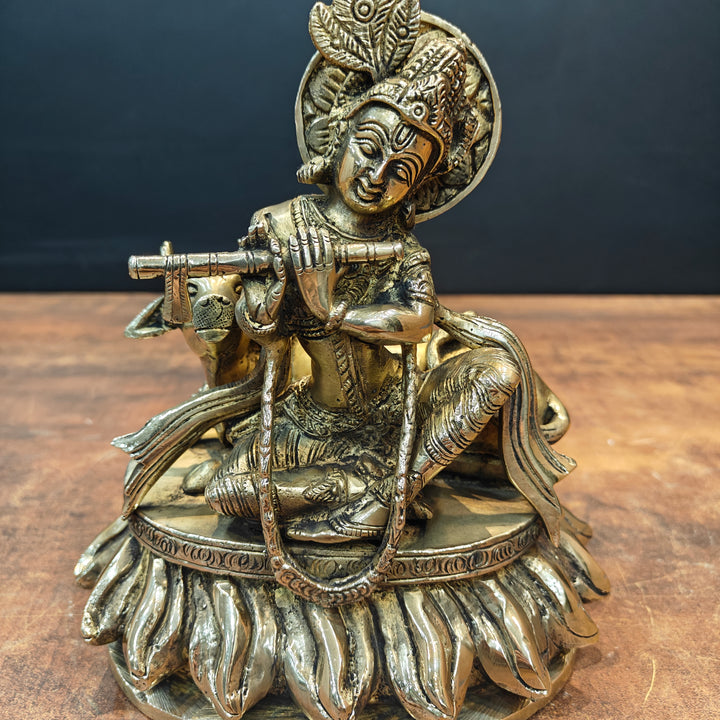 Brass Krishna Idol Seated With Cow On Pedestal 9 Inch