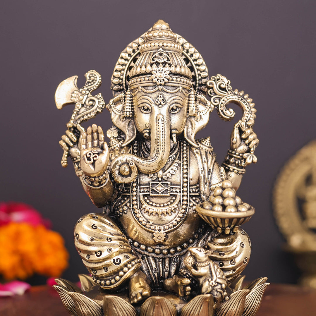Brass Superfine Right Trunk Ganesha Idol Seated on Lotus 5 Inch