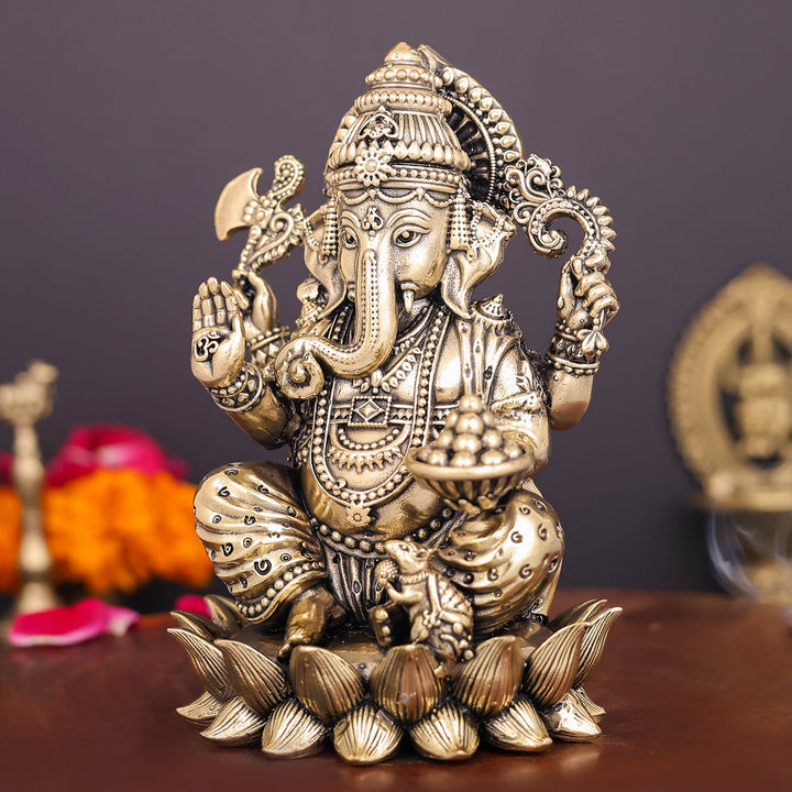 Brass Superfine Right Trunk Ganesha Idol Seated on Lotus 5 Inch
