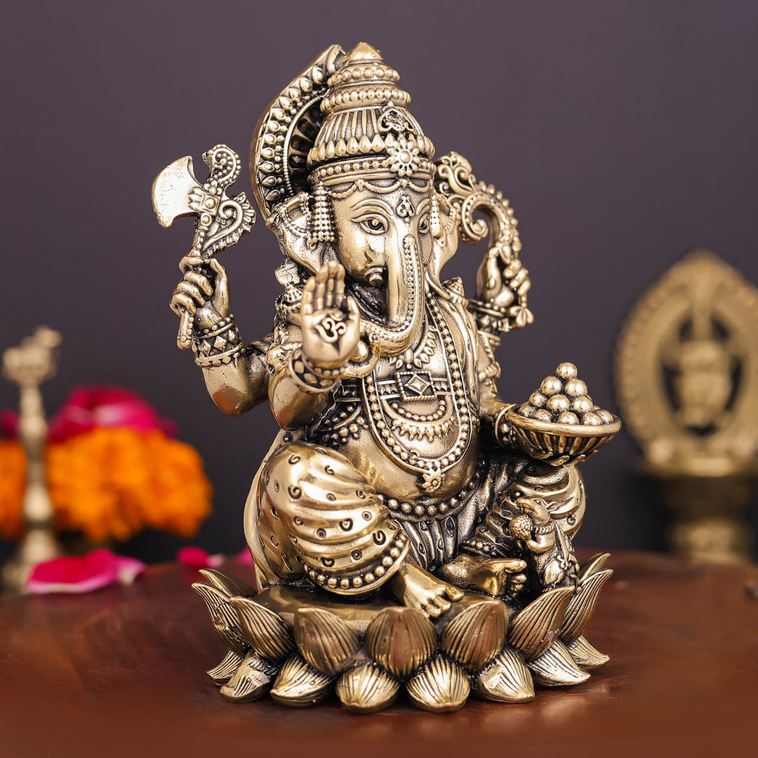 Brass Superfine Right Trunk Ganesha Idol Seated on Lotus 5 Inch