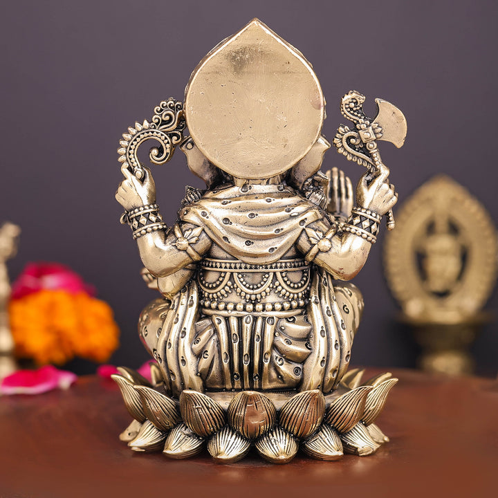 Brass Superfine Right Trunk Ganesha Idol Seated on Lotus 5 Inch