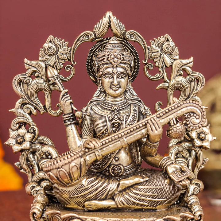 Brass Superfine Goddess Saraswati Idol with Floral Prabhavali 4 Inch