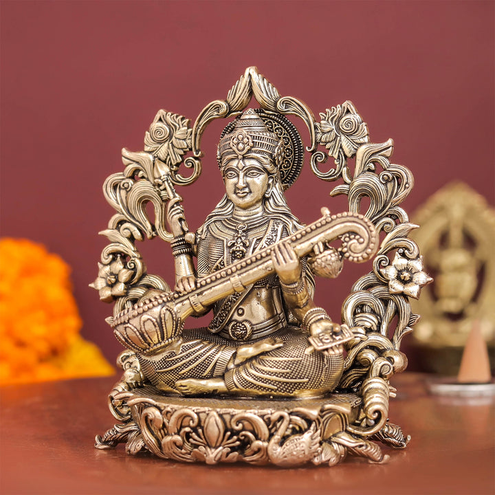 Brass Superfine Goddess Saraswati Idol with Floral Prabhavali 4 Inch