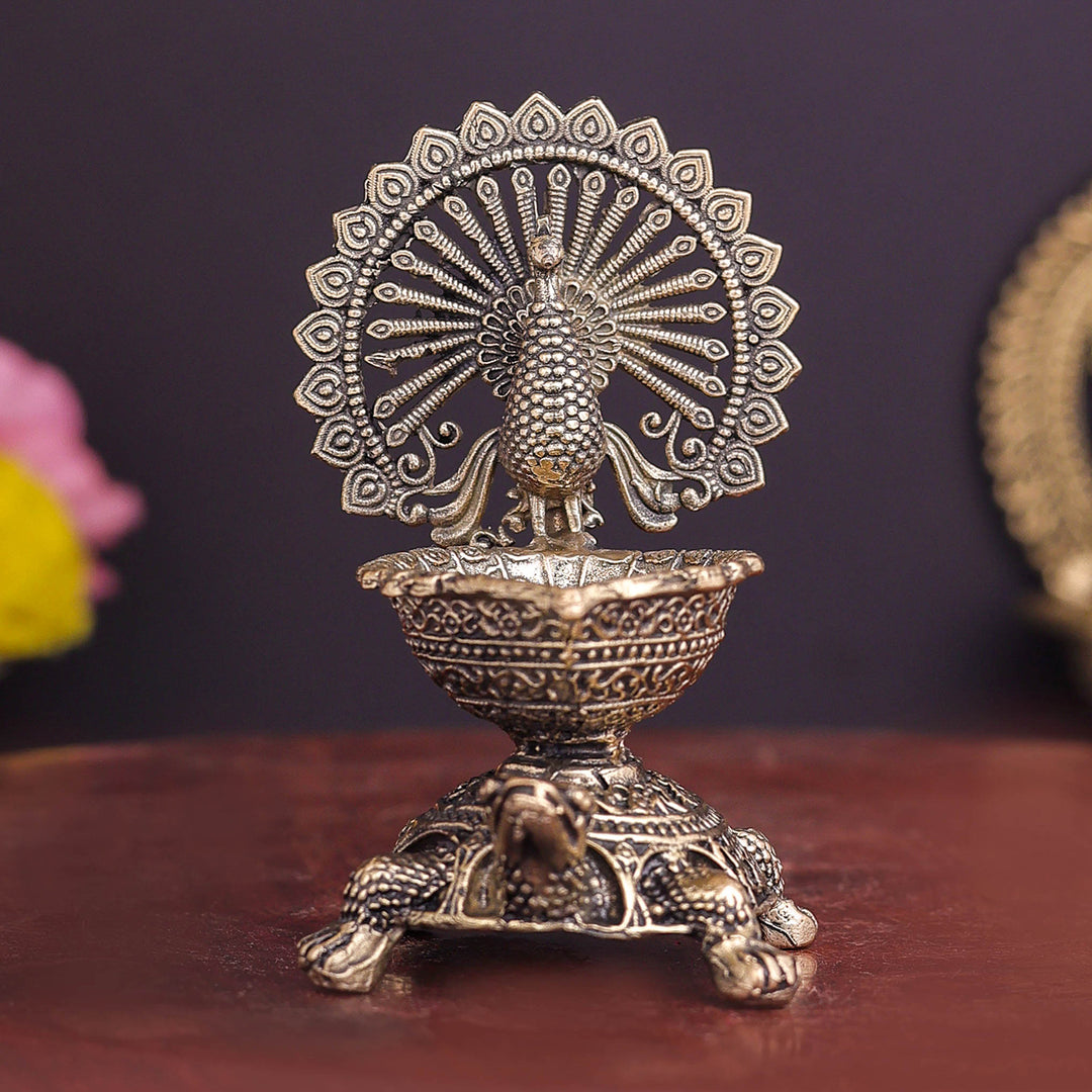 Brass Superfine Designer Peacock Diya Lamp on Tortoise 3.5 Inch