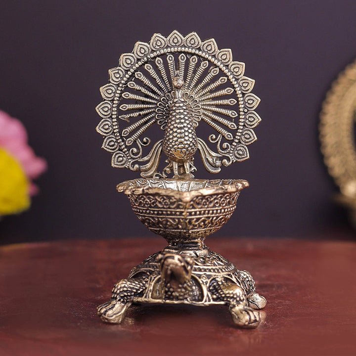 Brass Superfine Designer Peacock Diya Lamp on Tortoise 3.5 Inch