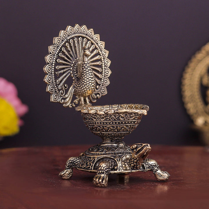 Brass Superfine Designer Peacock Diya Lamp on Tortoise 3.5 Inch