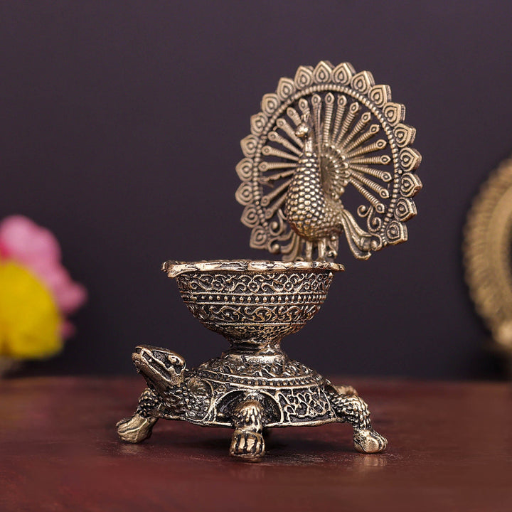 Brass Superfine Designer Peacock Diya Lamp on Tortoise 3.5 Inch