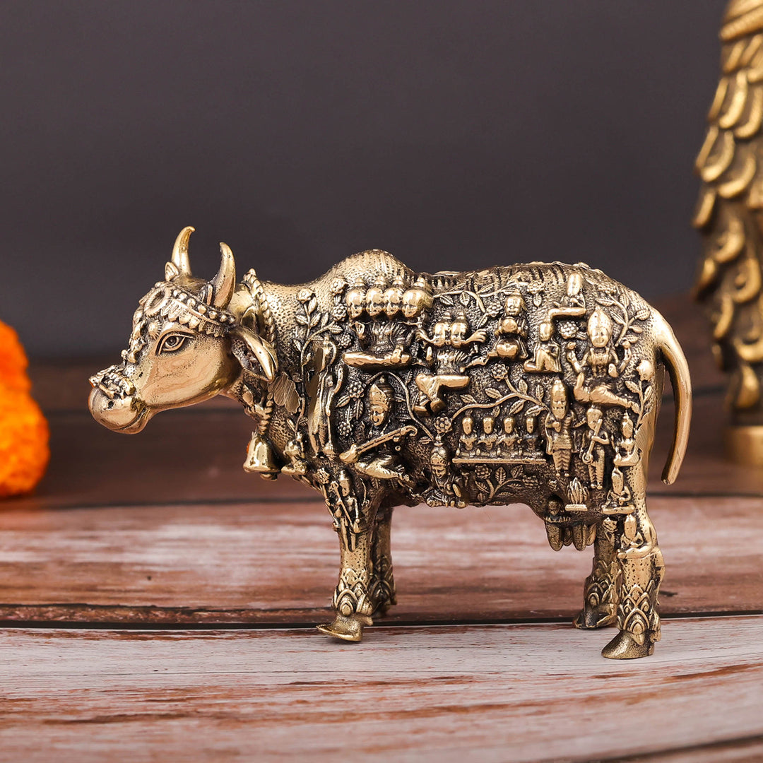 Brass Superfine Kamadhenu Cow with Engraved Gods and Goddesses 4 Inch