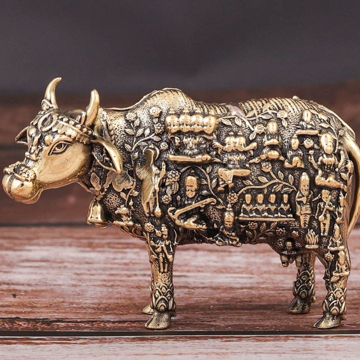 Brass Superfine Small Kamadhenu Cow with Engraved Gods and Goddesses 3 Inch
