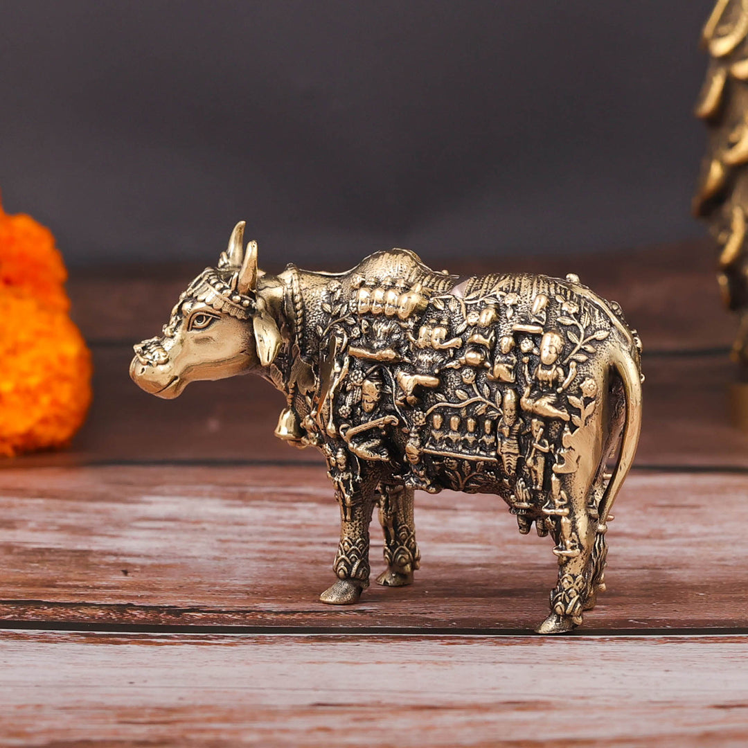 Brass Superfine Small Kamadhenu Cow with Engraved Gods and Goddesses 3 Inch