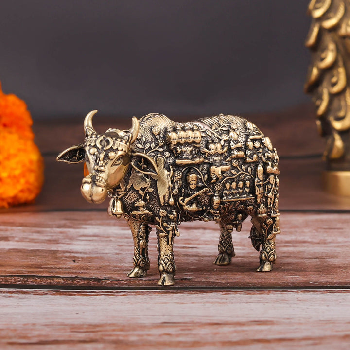 Brass Superfine Small Kamadhenu Cow with Engraved Gods and Goddesses 3 Inch