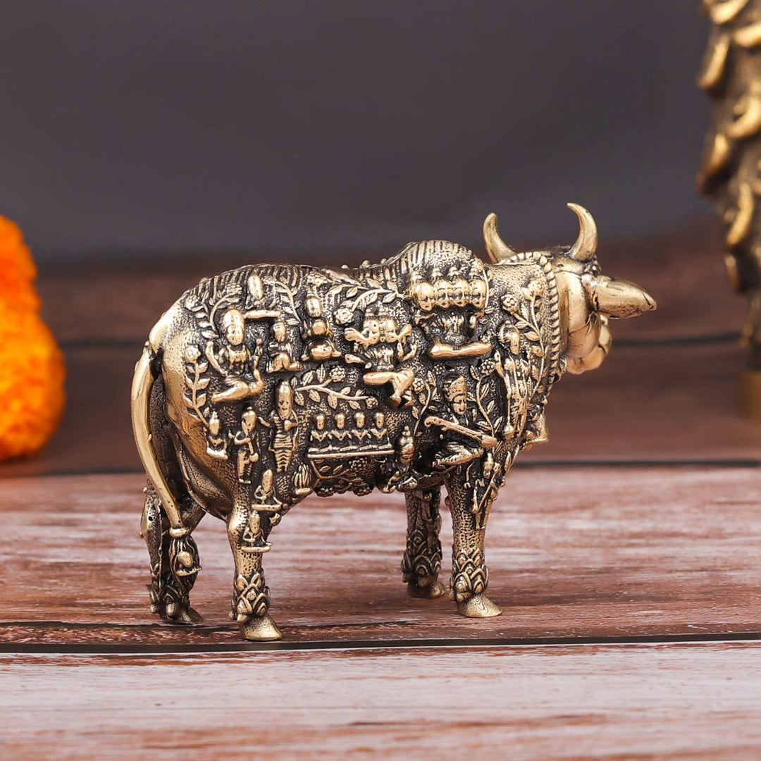 Brass Superfine Small Kamadhenu Cow with Engraved Gods and Goddesses 3 Inch