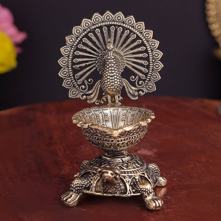Brass Superfine Designer Peacock Diya Lamp on Tortoise 3.5 Inch 463900