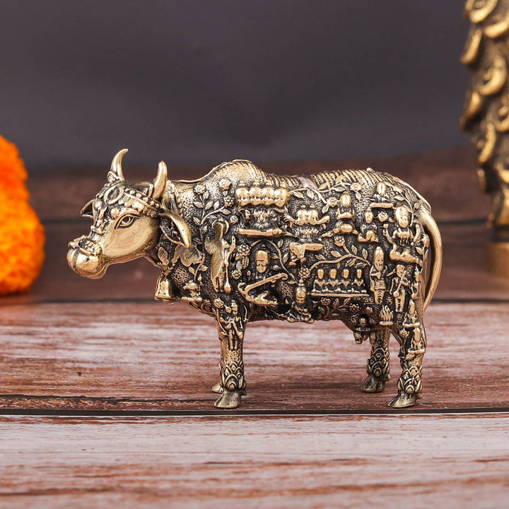 Brass Superfine Small Kamadhenu Cow with Engraved Gods and Goddesses 3 Inch 463962
