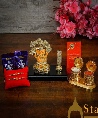 StatueStudio Rakhi Gift For Brother With Rakshabhandhan Gift Hamper Combo - Rakhi For Brother Set Of 2,  Greeting Card, 2 pcs Dairy Milk, Roli Chawal, Ganesha Pen Stand, Kum Kum Dabbi