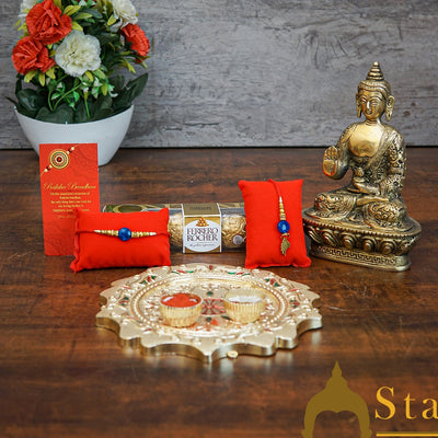 StatueStudio Rakhi Gift For Bhaiya & Bhabhi With Rakshabhandhan Gift Hamper Combo - Lumba Rakhi For Bhaiya & Bhabhi,  Greeting Card, 4 pcs Ferrero Rocher box, Roli Chawal, Pooja Thali & Brass Buddha, Kum Kum Dabbi