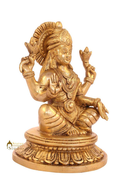 Brass hindu goddess of wealth sitting on base religious room décor 8"